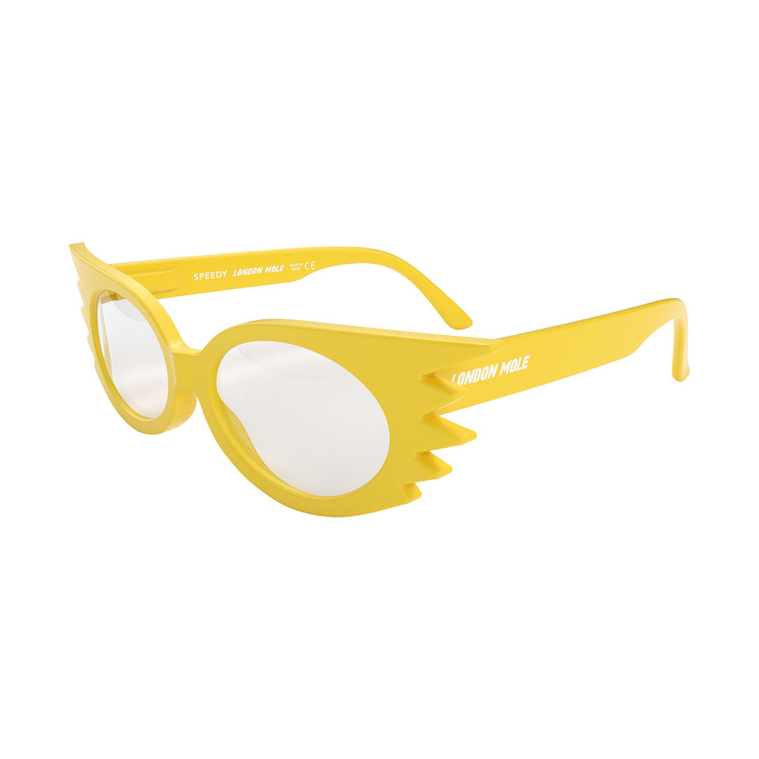 open skew - Speedy Blue Blocker Glasses in matt yellow featuring an extravagent vintage frame with a utilitarian look and the ability to protect your eyes from artificial blue light. Ideal for fashion accessories, screen time, office work, gaming, scrolling on a mobile, and watching TV. 