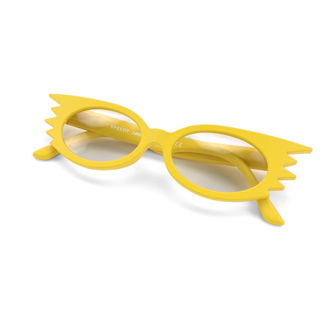 Folded skew - Speedy Blue Blocker Glasses in matt yellow featuring an extravagent vintage frame with a utilitarian look and the ability to protect your eyes from artificial blue light. Ideal for fashion accessories, screen time, office work, gaming, scrolling on a mobile, and watching TV. 