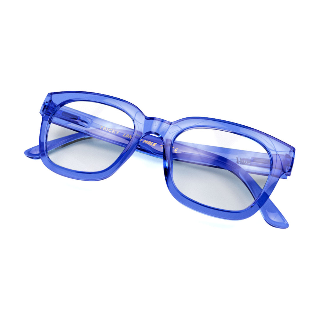 Closed skew view of the London Mole Tricky Reading Glasses in Transparent Blue