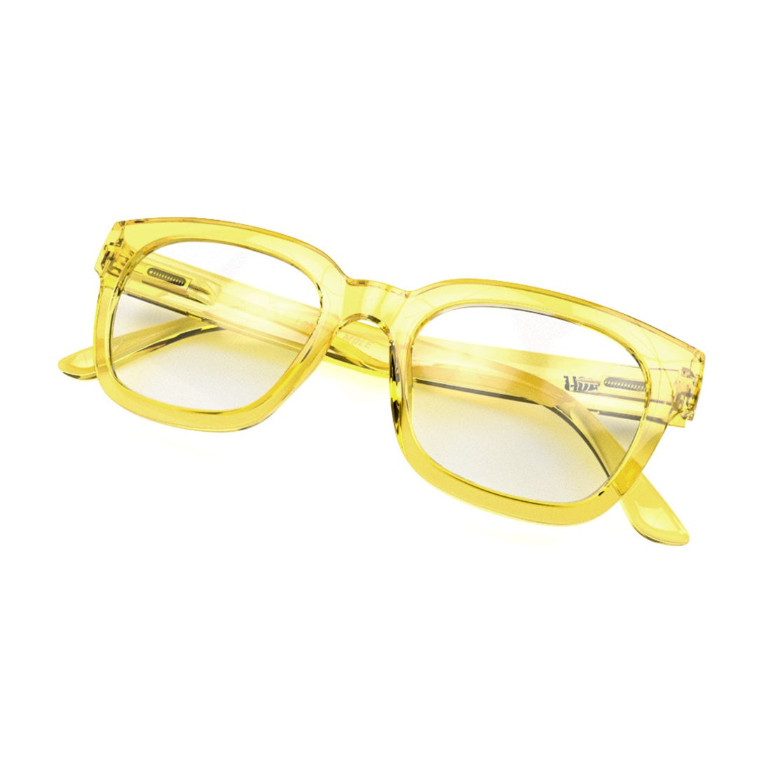 Closed skew view of the London Mole Tricky Blue Blocker Glasses in Transparent Yellow