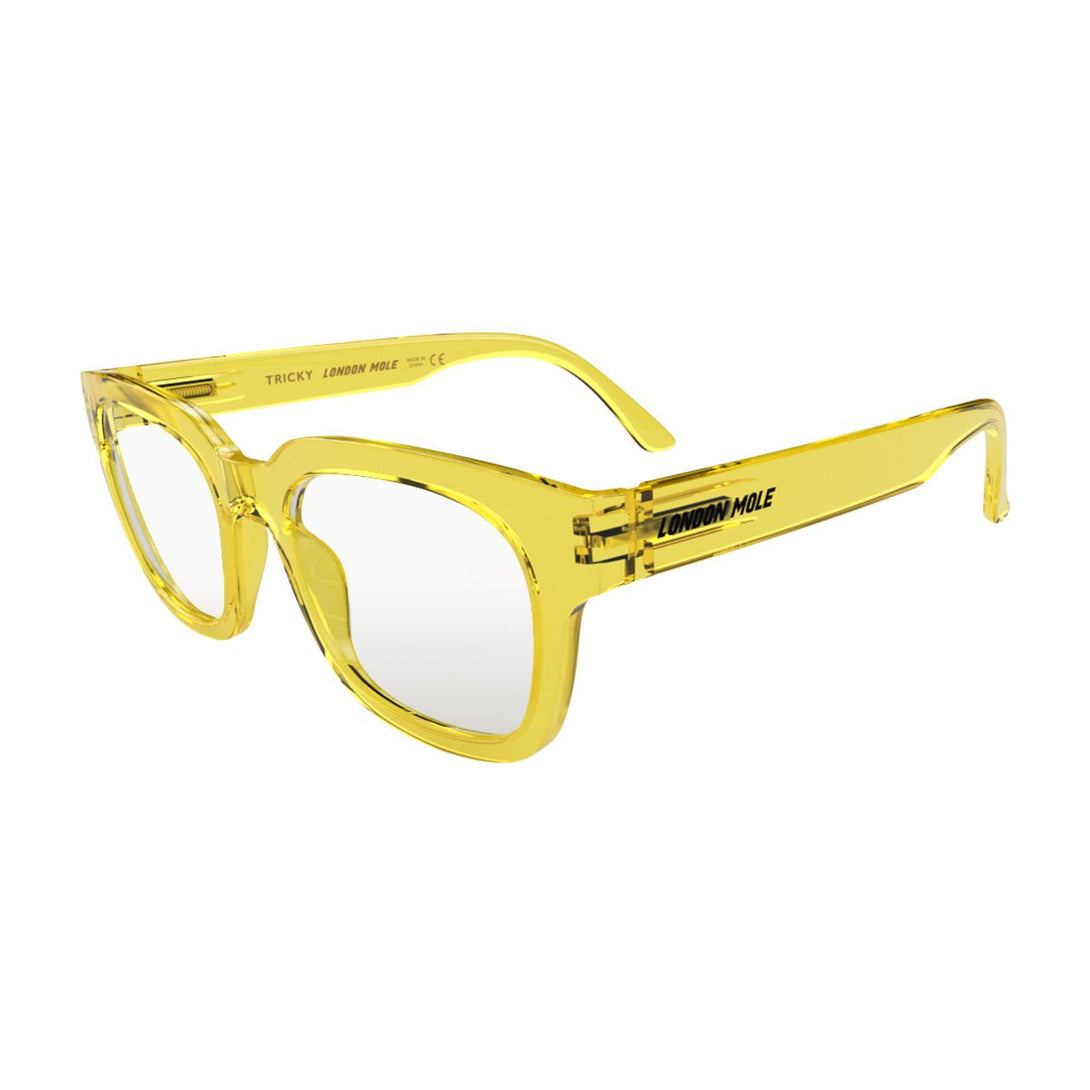 Open skew view of the London Mole Tricky Blue Blocker Glasses in Transparent Yellow