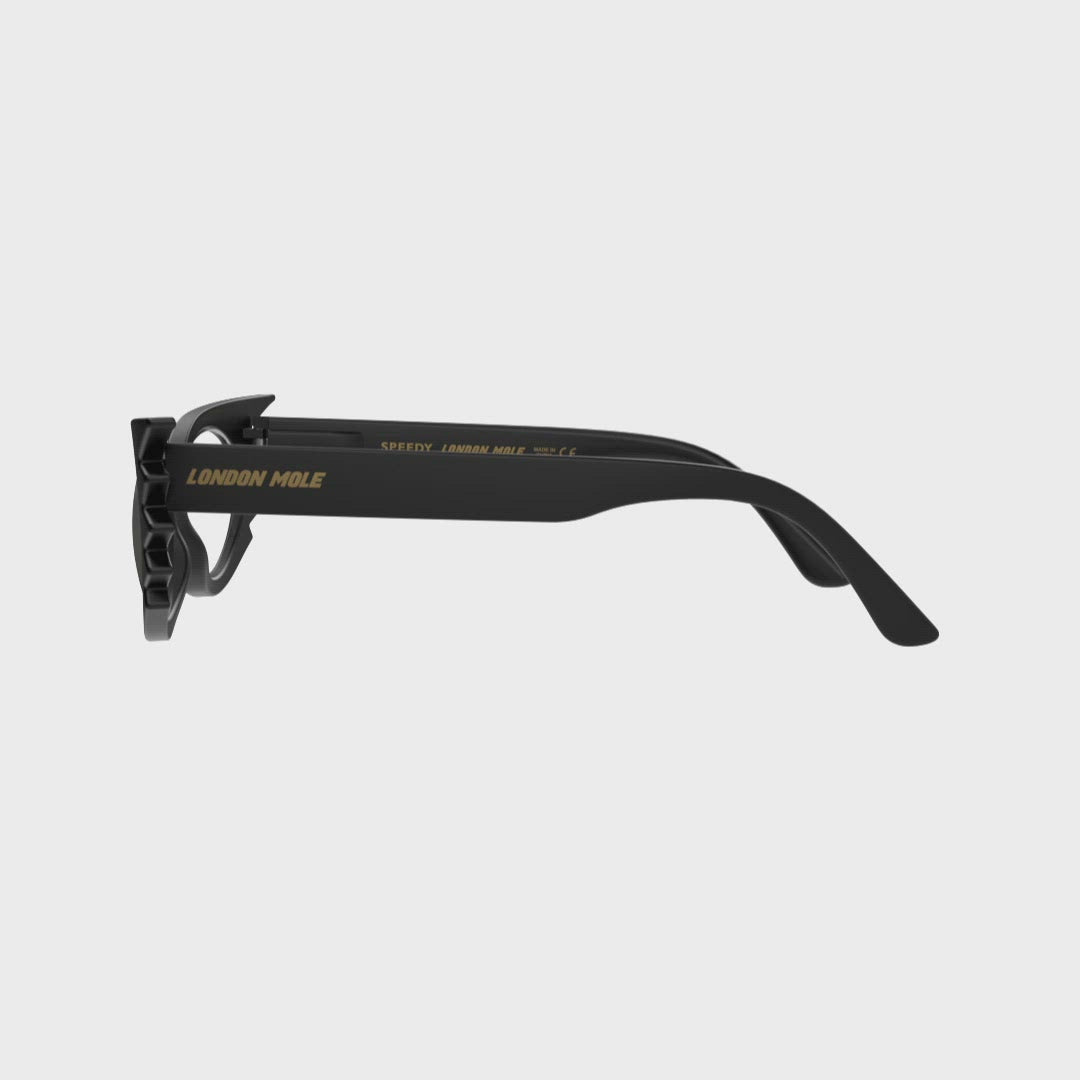 360 Turning Animation - Speedy Blue Blocker Glasses in matt black featuring an extravagent vintage frame with a utilitarian look and the ability to protect your eyes from artificial blue light. Ideal for fashion accessories, screen time, office work, gaming, scrolling on a mobile, and watching TV. 